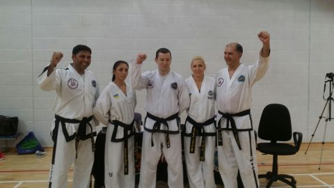 Black belts celebrating